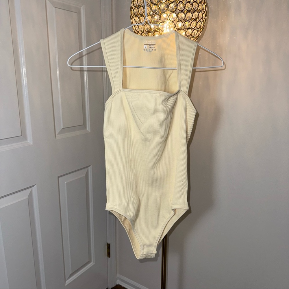 11. 💗OQQ  Cream body suit 
Never worn 
Ribbed tight